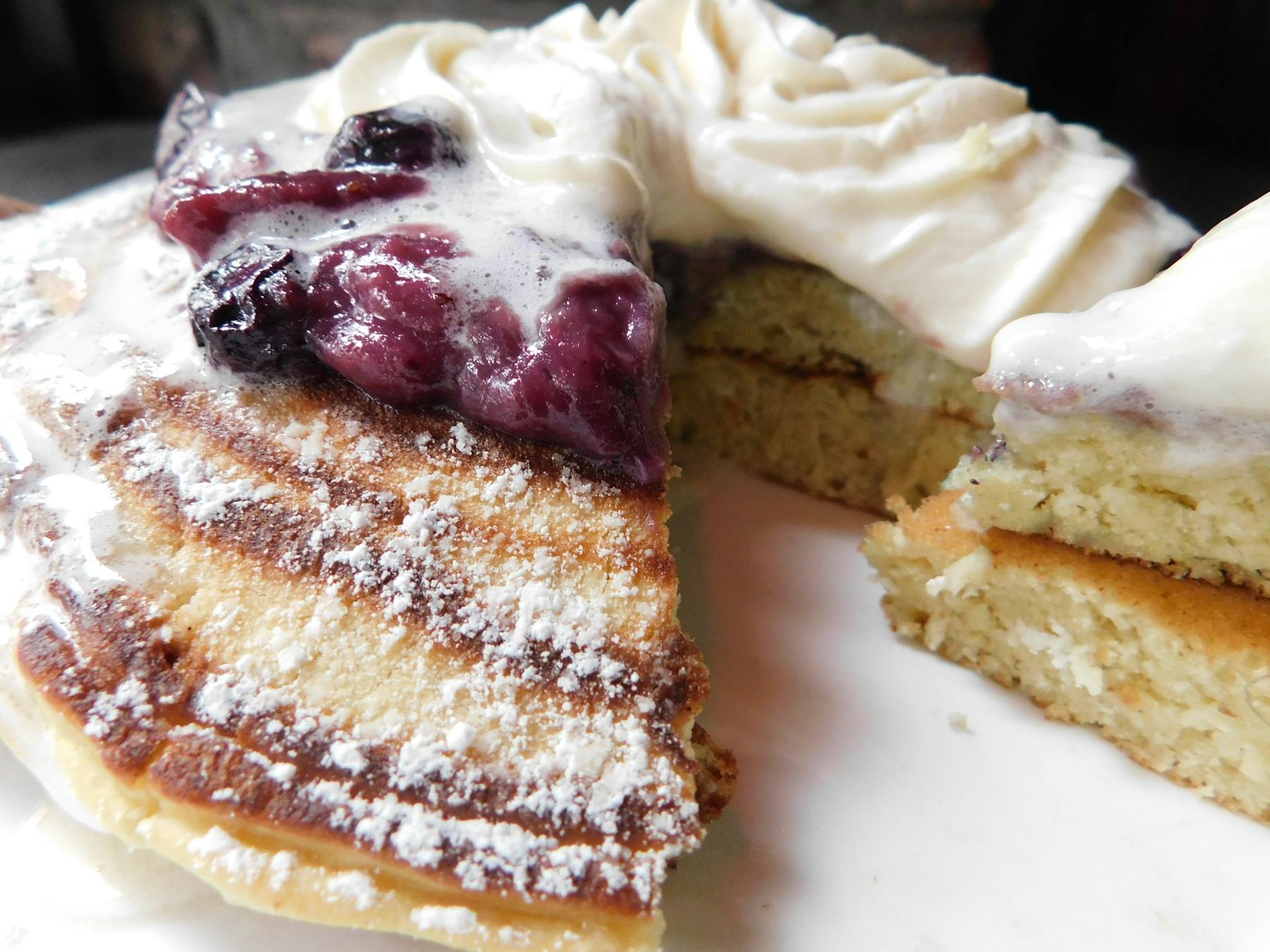 a piece of cake and ice cream on a plate