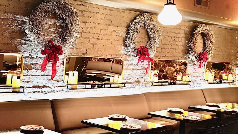 a desk with a laptop on a table