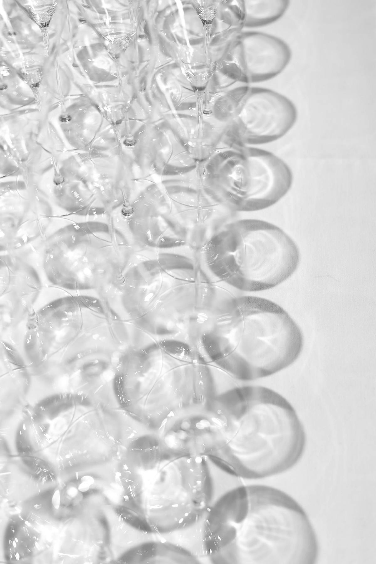 a close up of several wine cups on a table