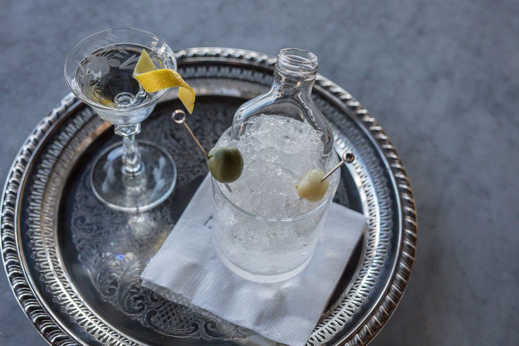 a silver cup sitting on a table