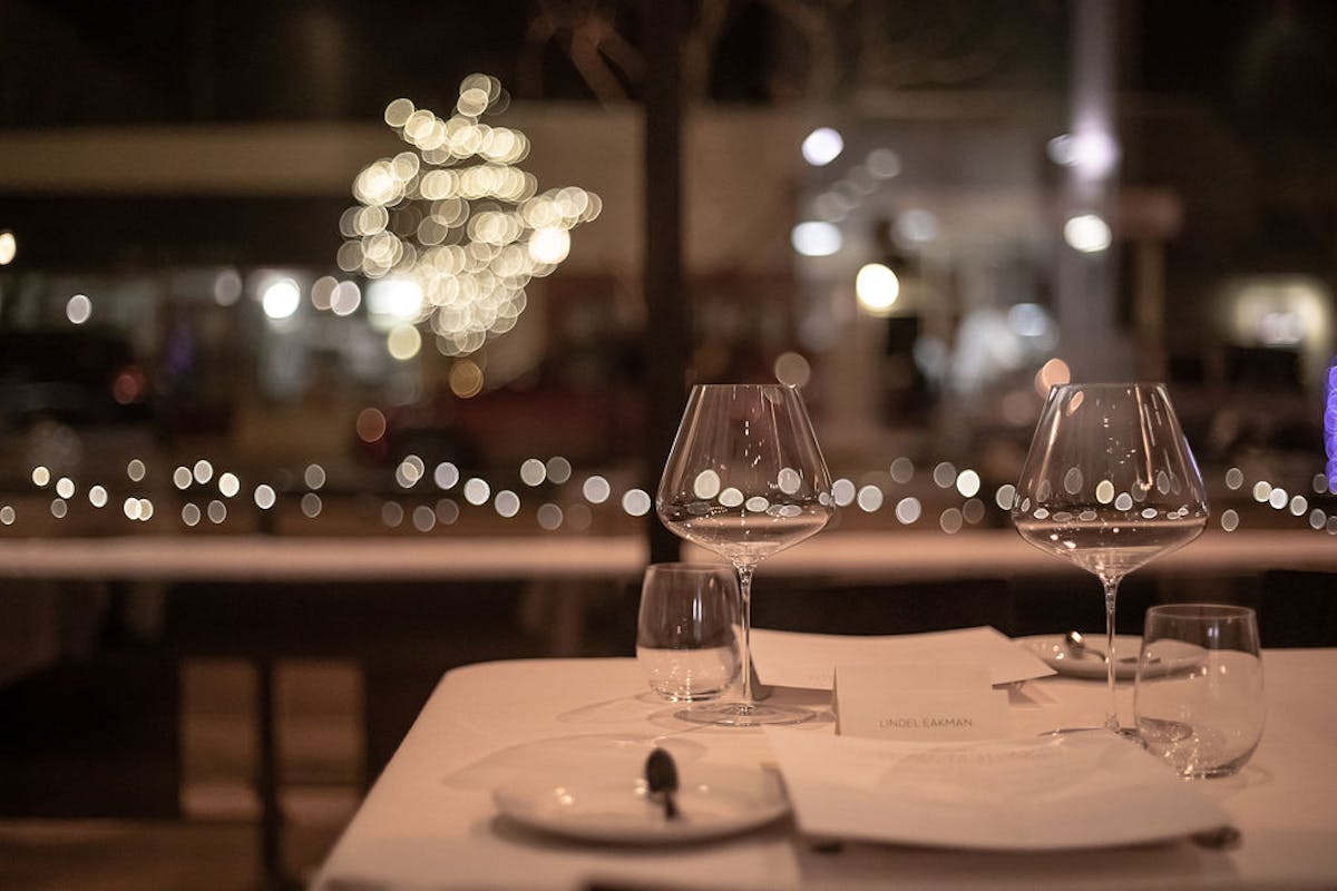 a table with wine glasses