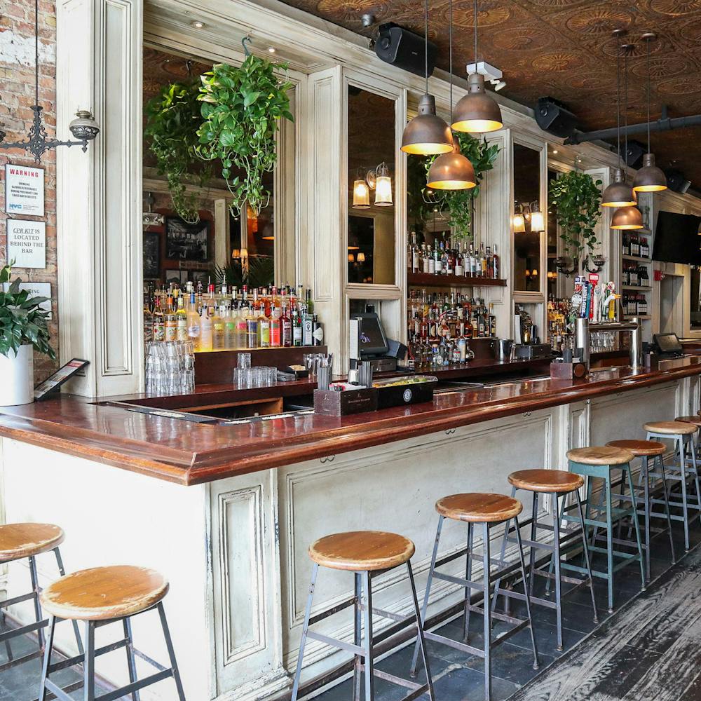 a kitchen area with a building in the background