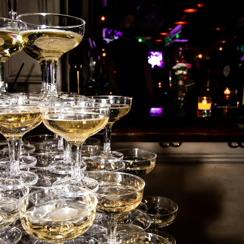 a table filled with wine glasses