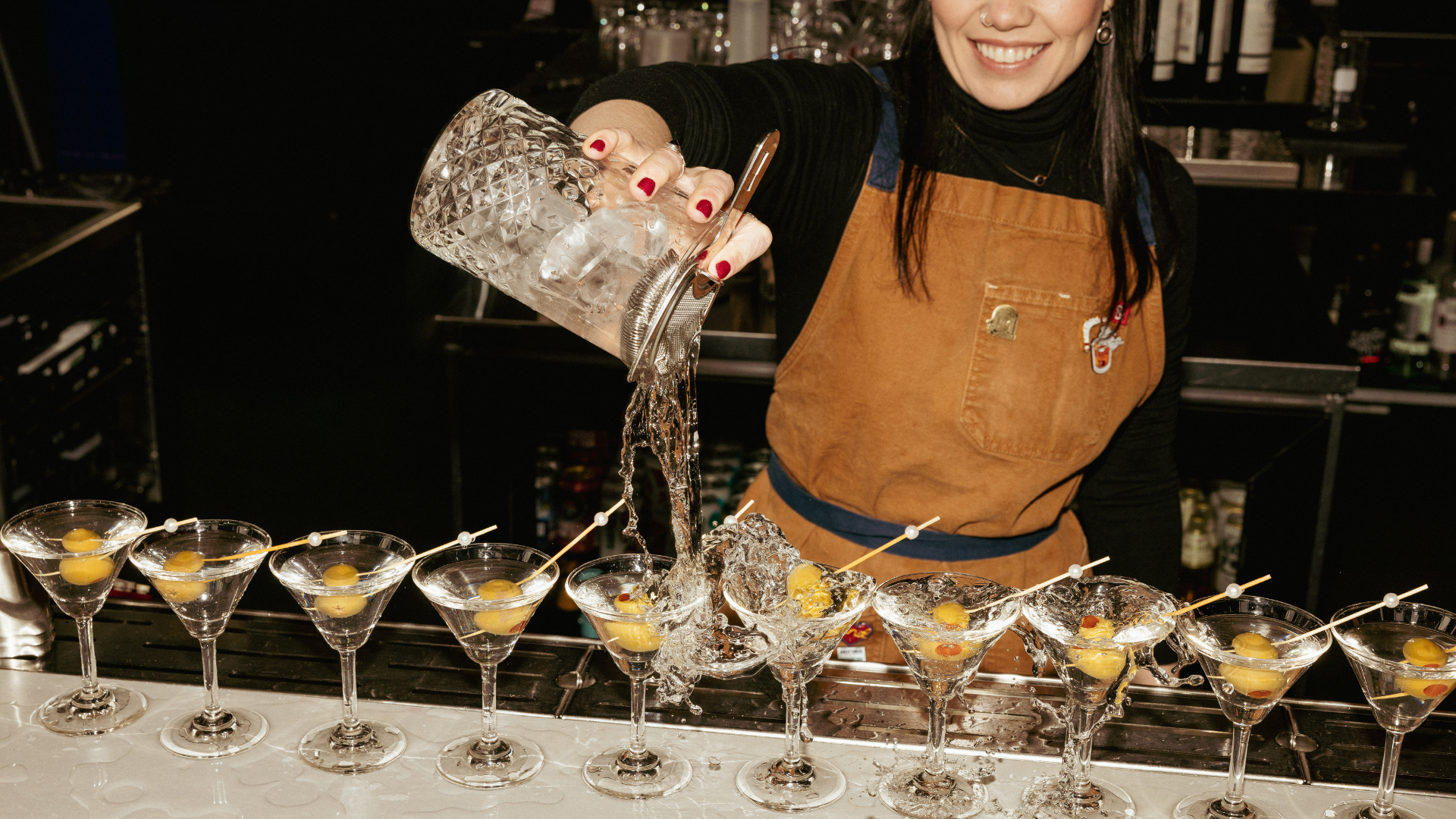 Cocktails being poured at the bar