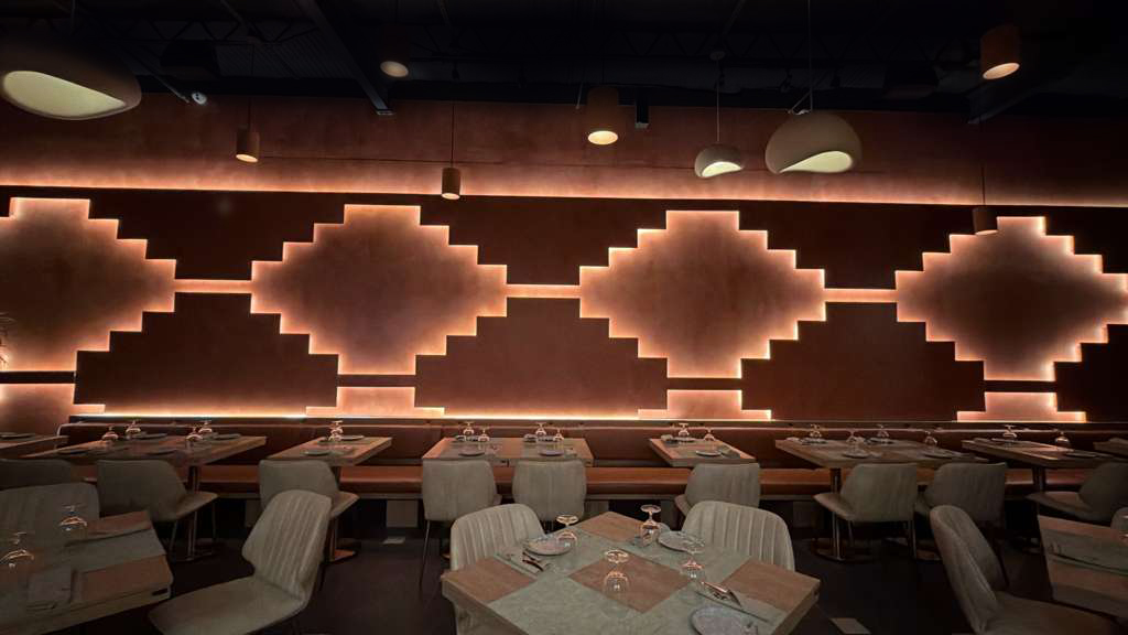 a room with tables and chairs