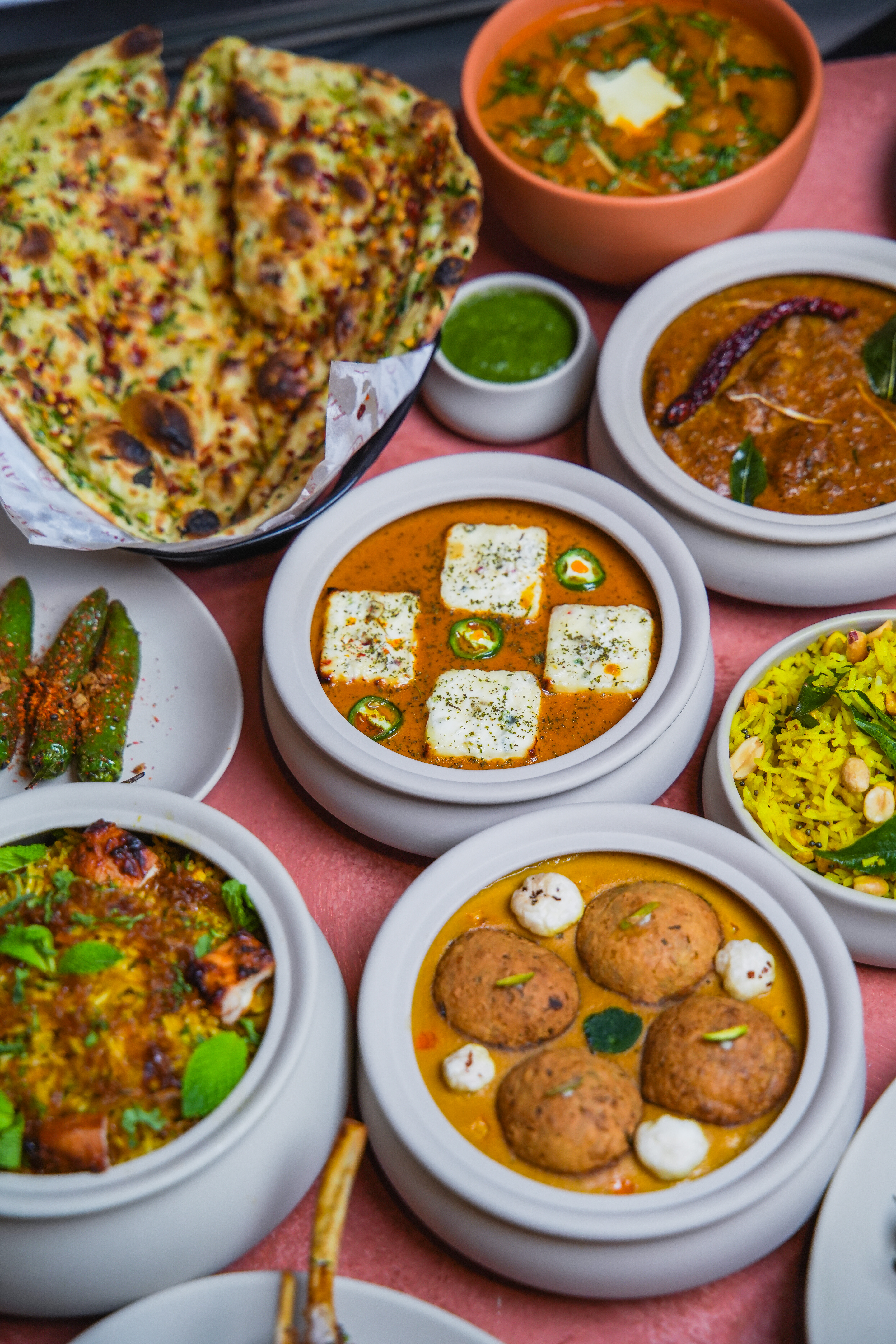 a group of bowls of food
