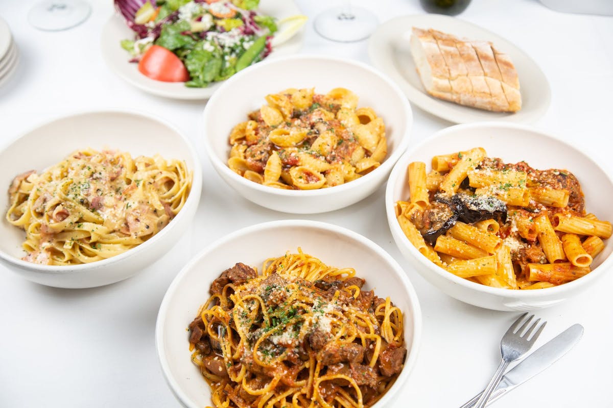 a bowl filled with different types of food on a plate