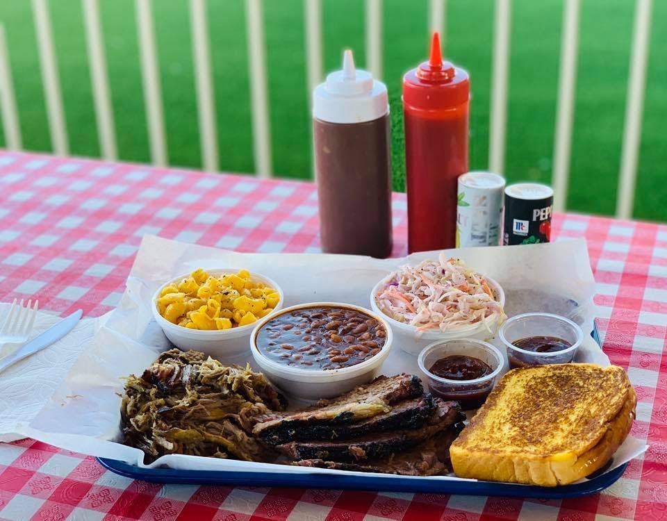 a plate of food on a picnic table