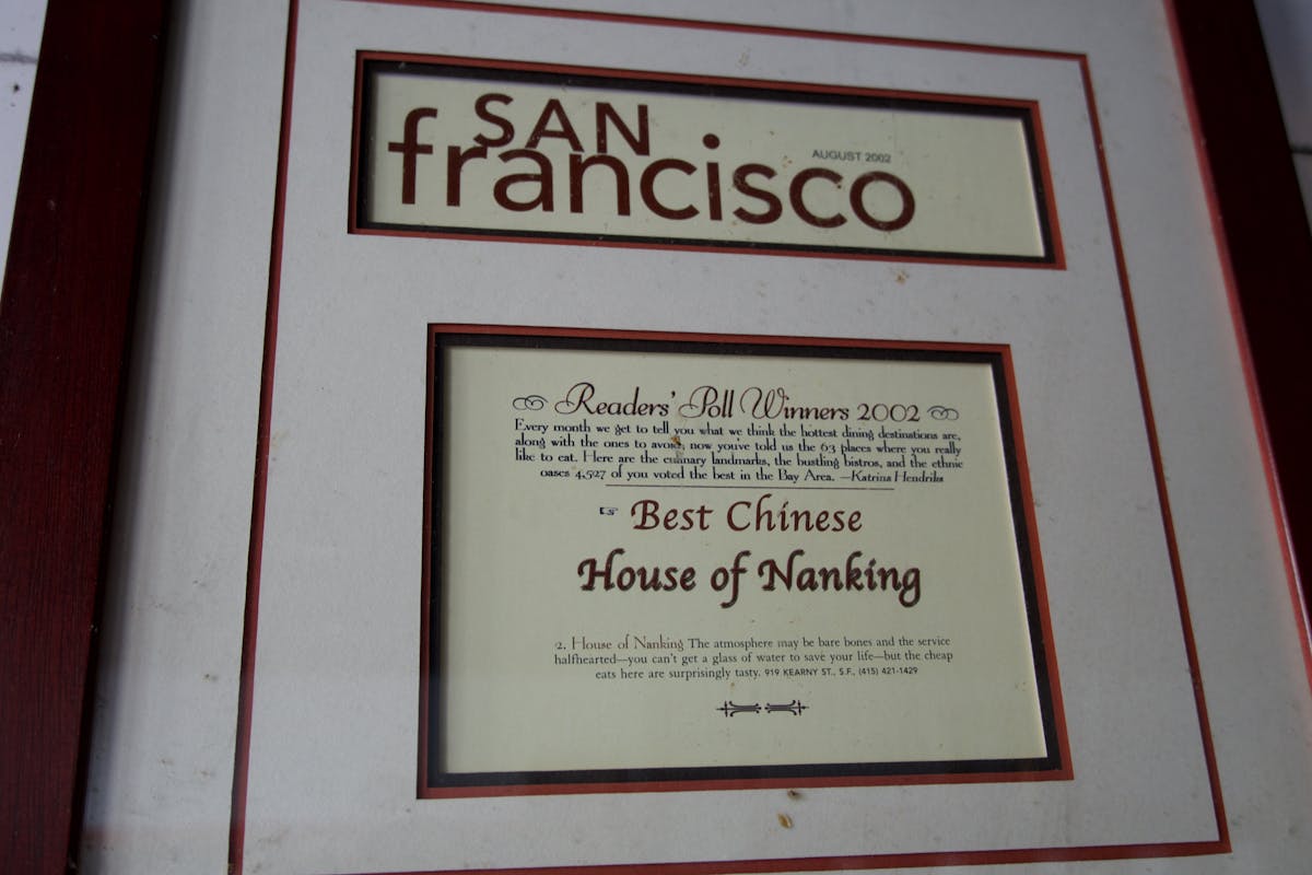 a black sign with white text