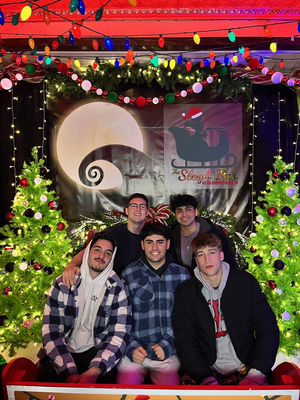 a group of people posing for the camera