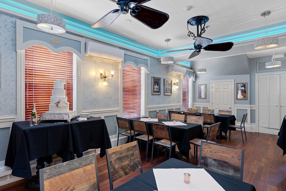 a dining room table in front of a building