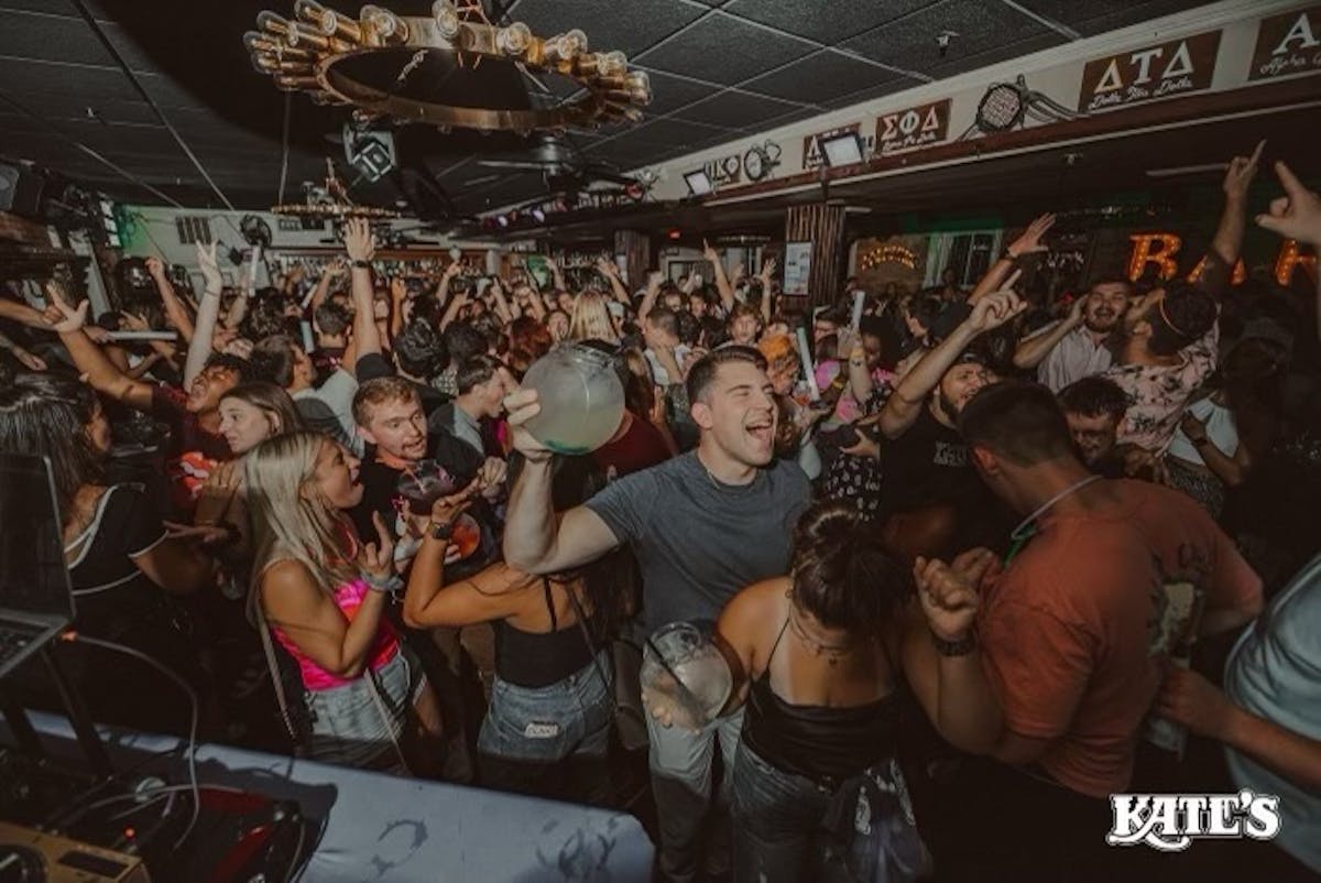 a group of people standing in front of a crowd