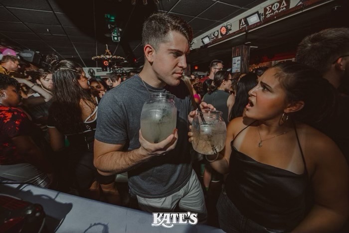 a person holding a glass of wine