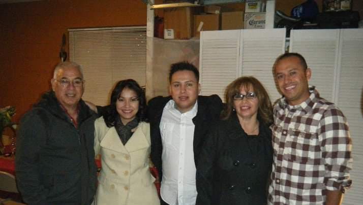 a group of people posing for the camera