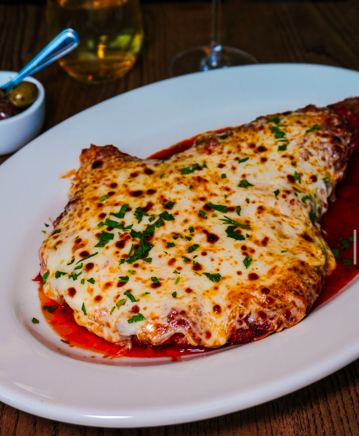 a slice of pizza on a plate