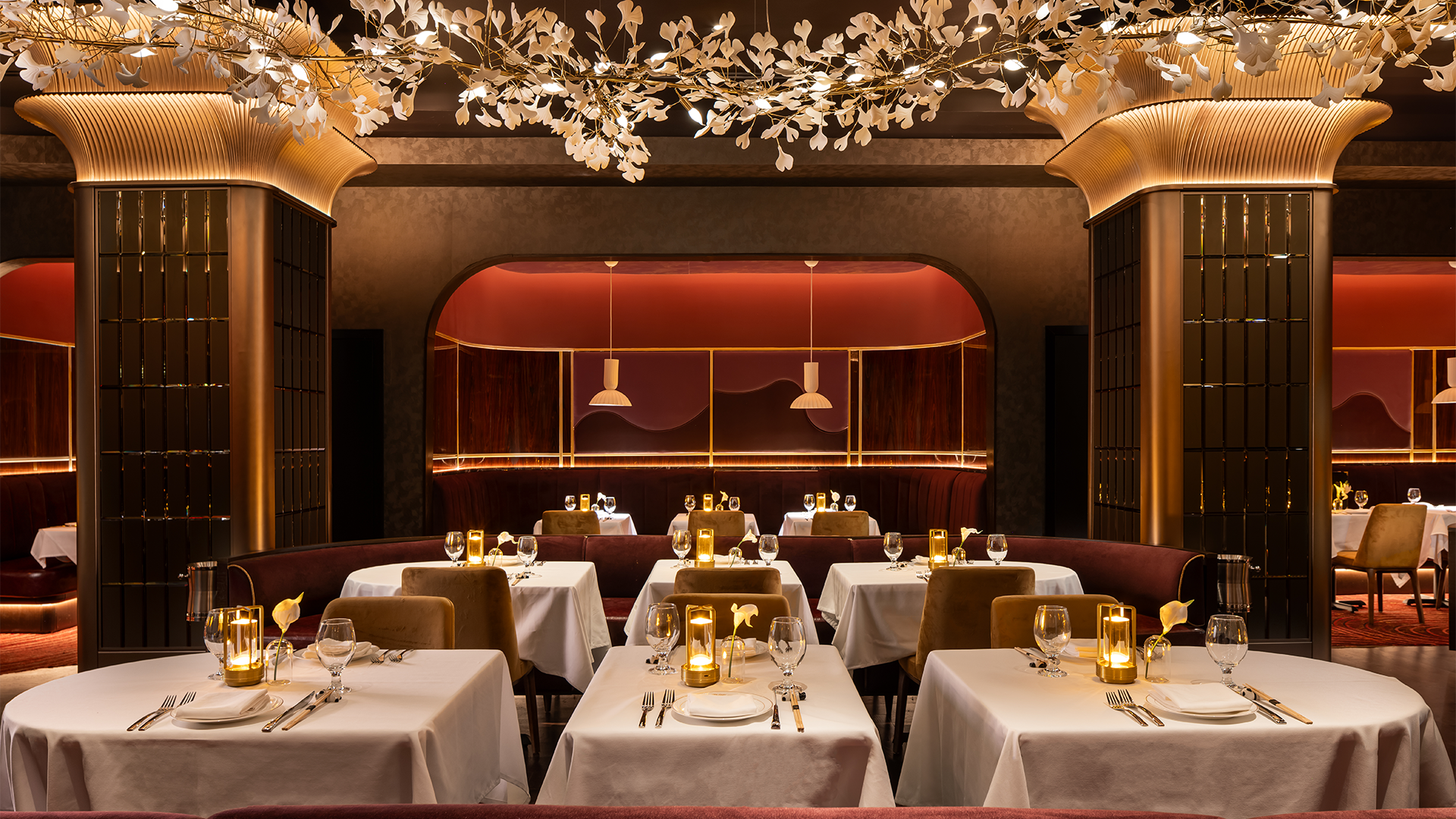 a dining room table in front of a mirror posing for the camera