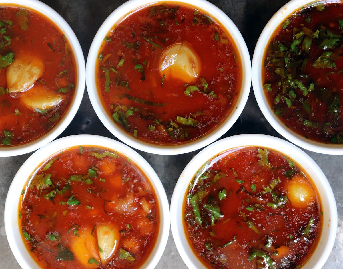 a bowl filled with different types of food on a table
