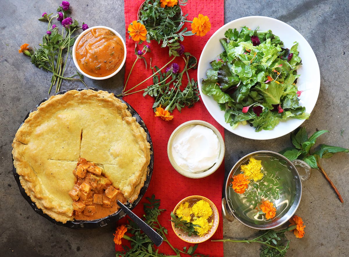 a bowl filled with different types of food on a plate