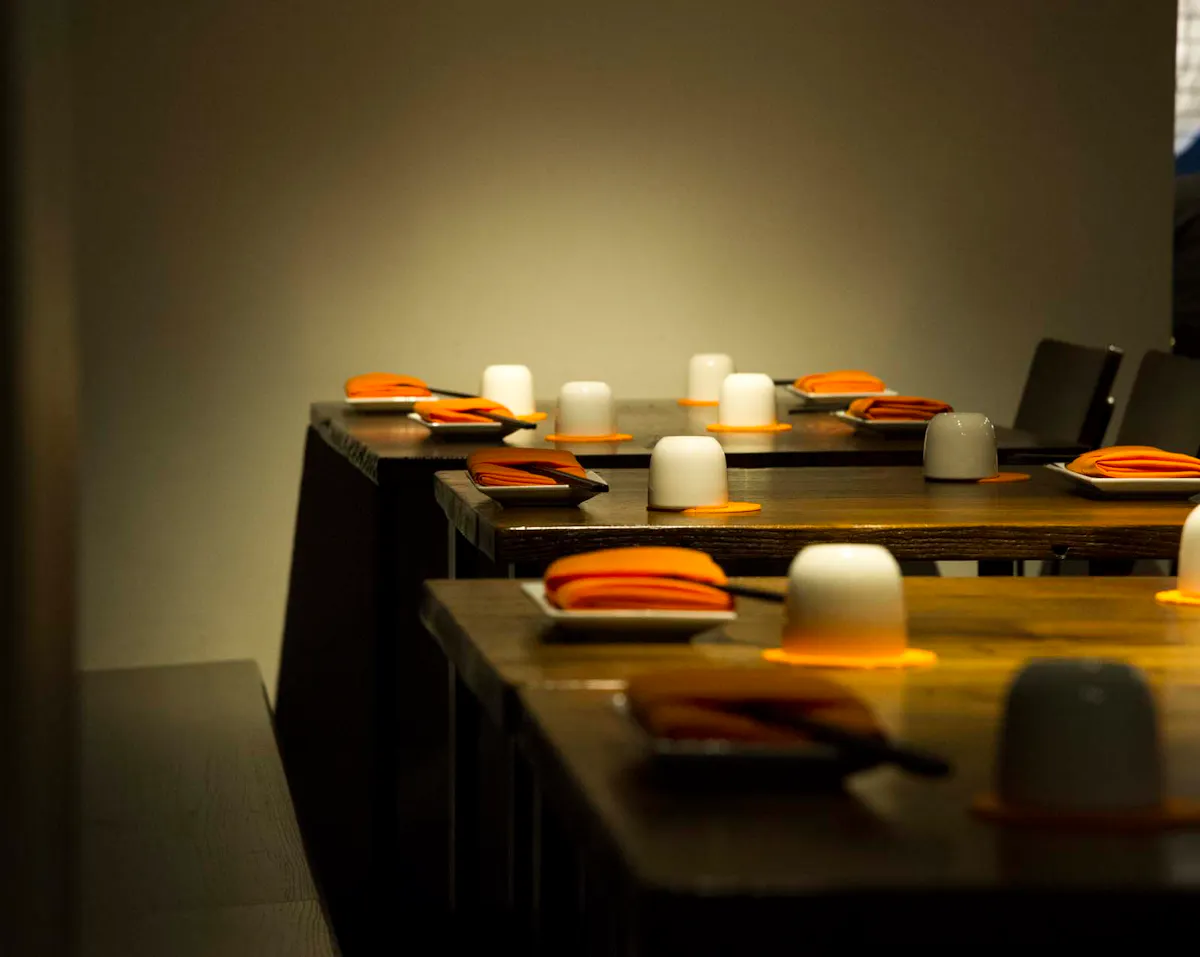 a desk with a computer on a table