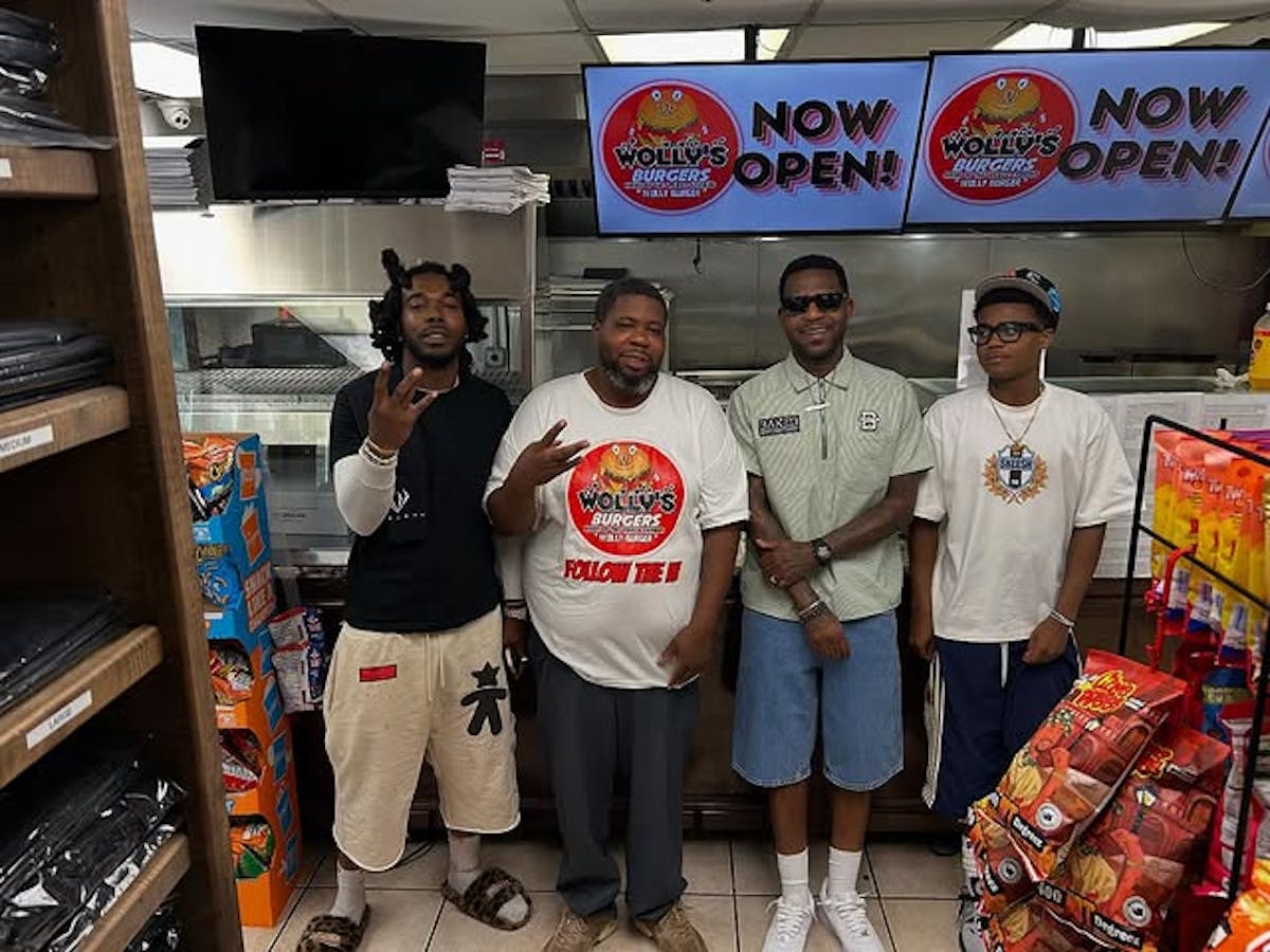 a group of people standing in front of a store