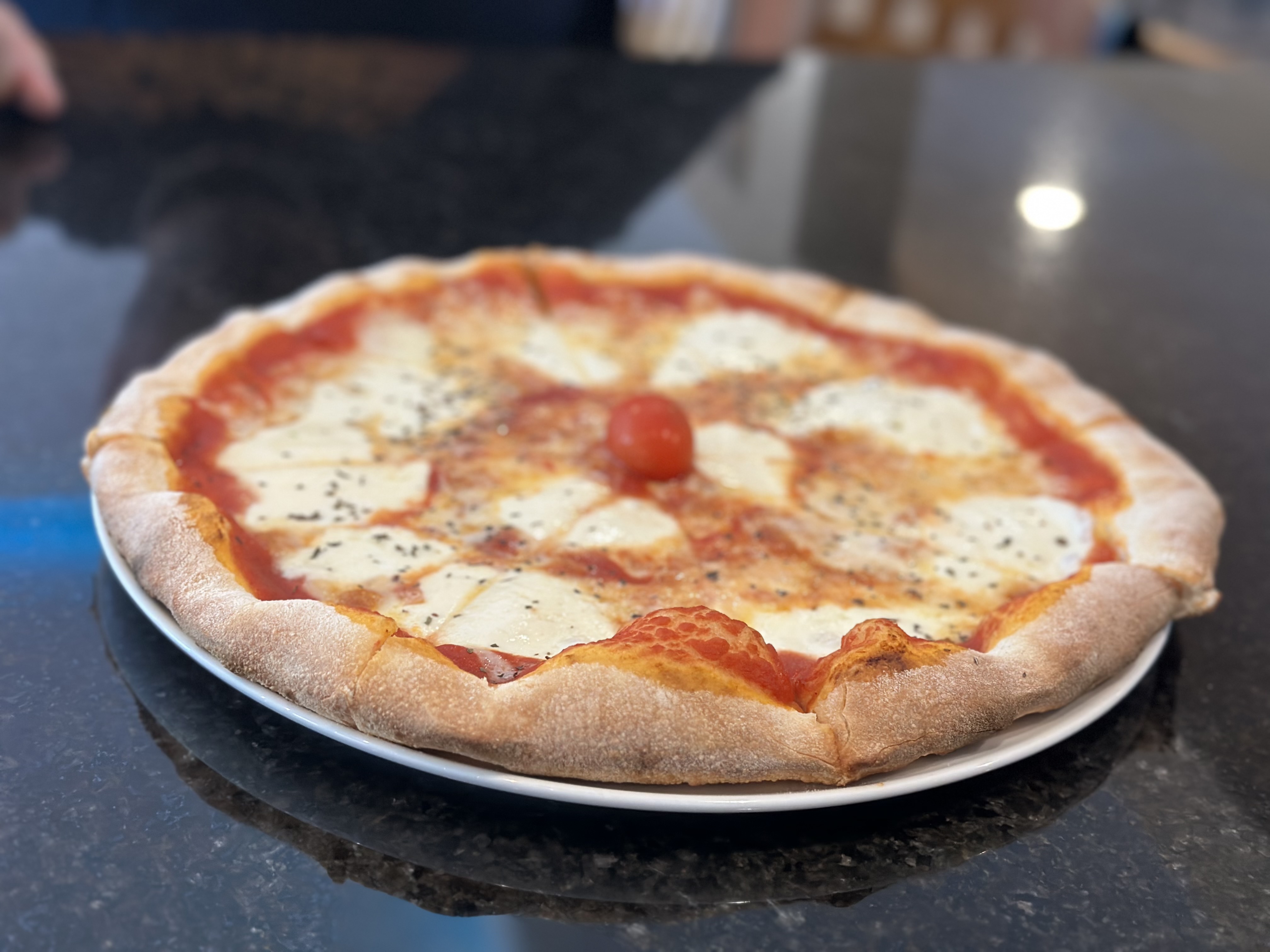 a pizza sitting on top of a table