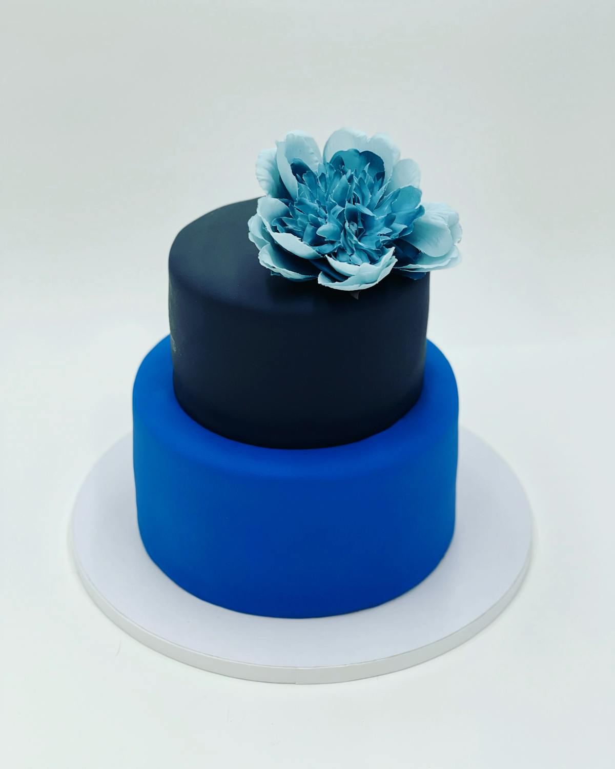 a blue and white cake
