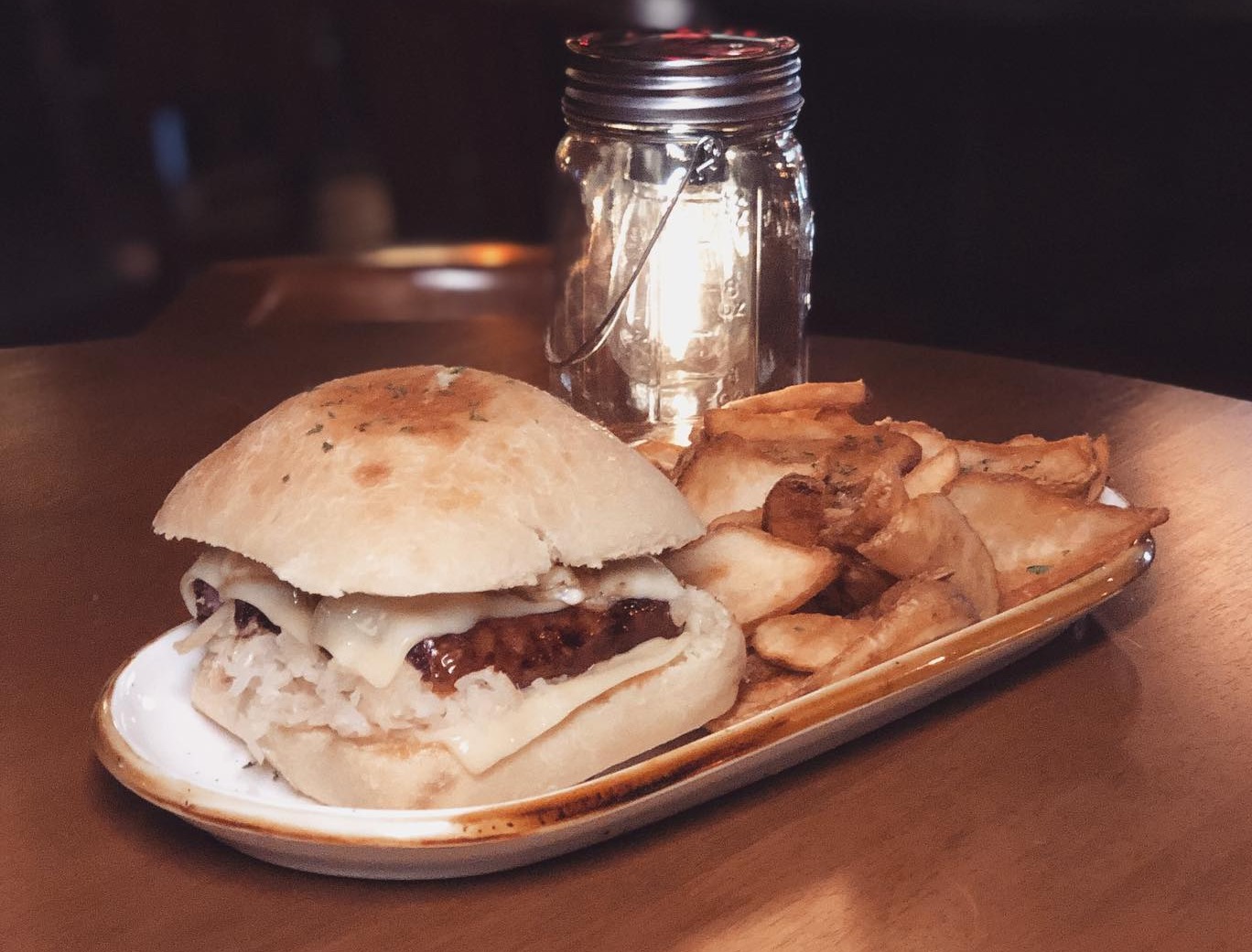 a sandwich sitting on top of a wooden table