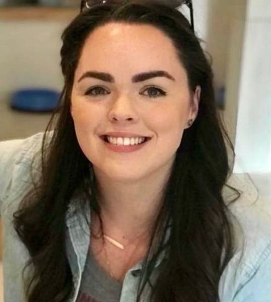 a woman smiling for the camera