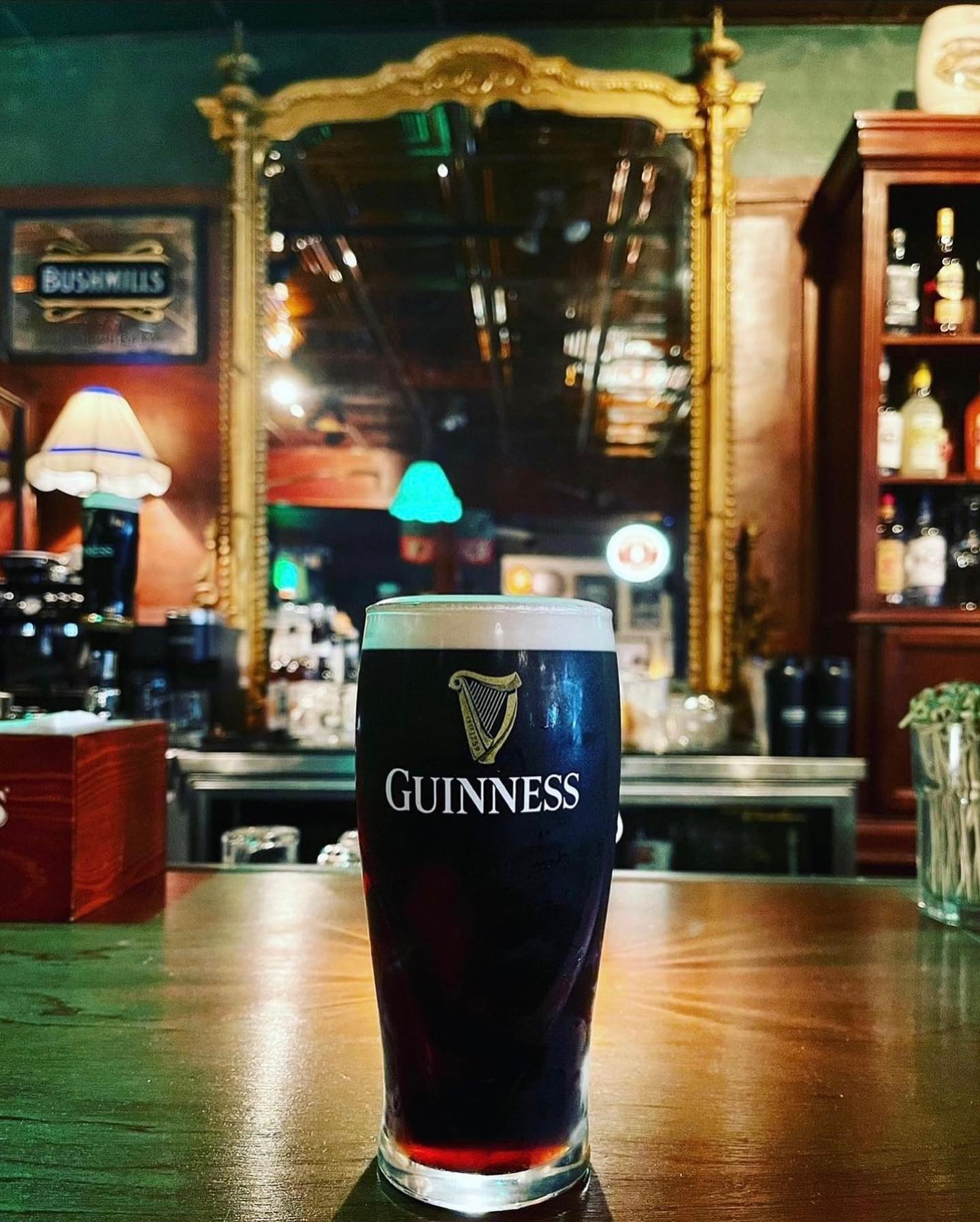 a glass of beer on a table