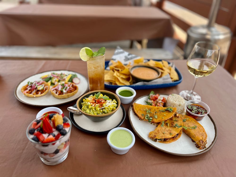 a table topped with plates of food on a plate