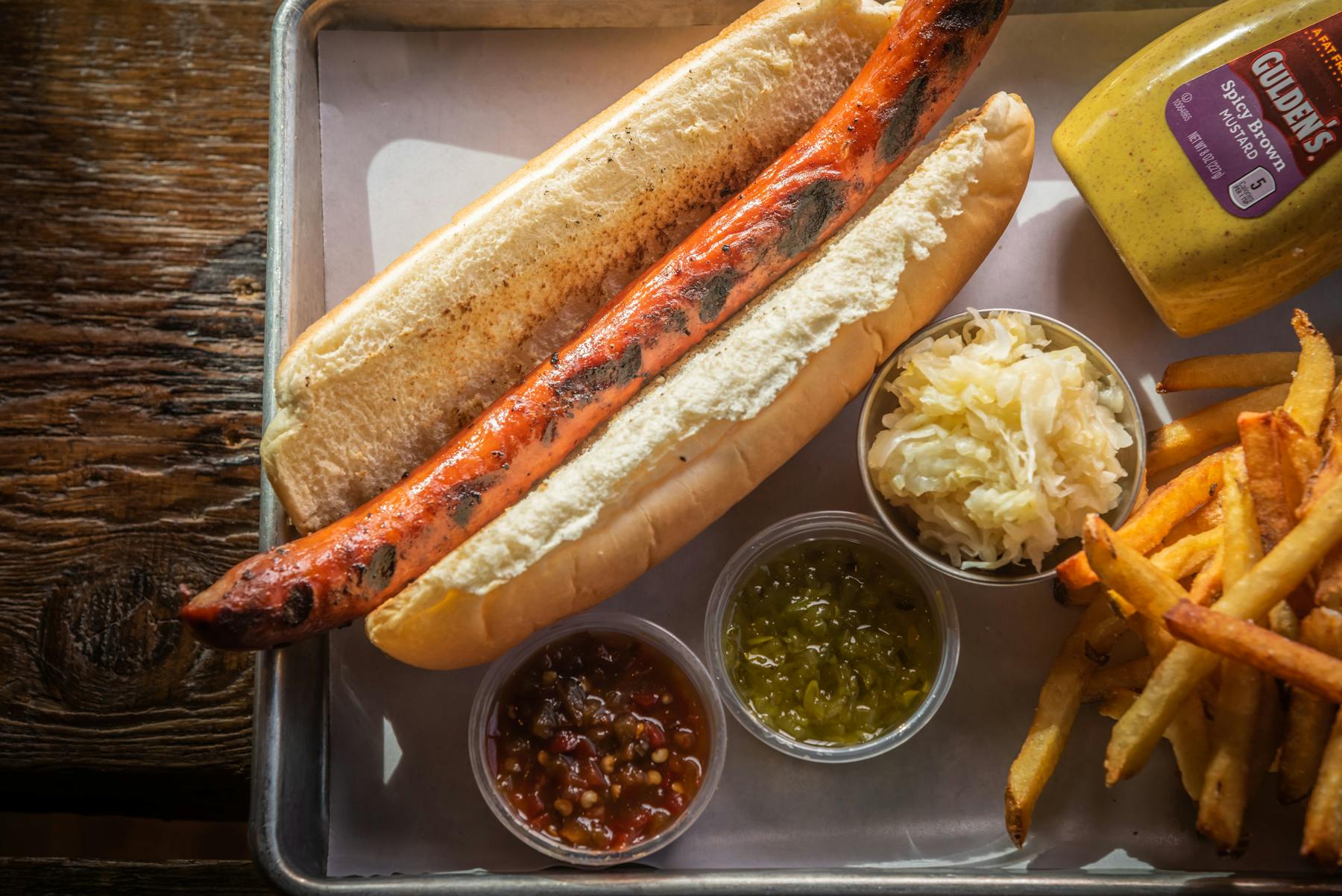 a tray with a hot dog