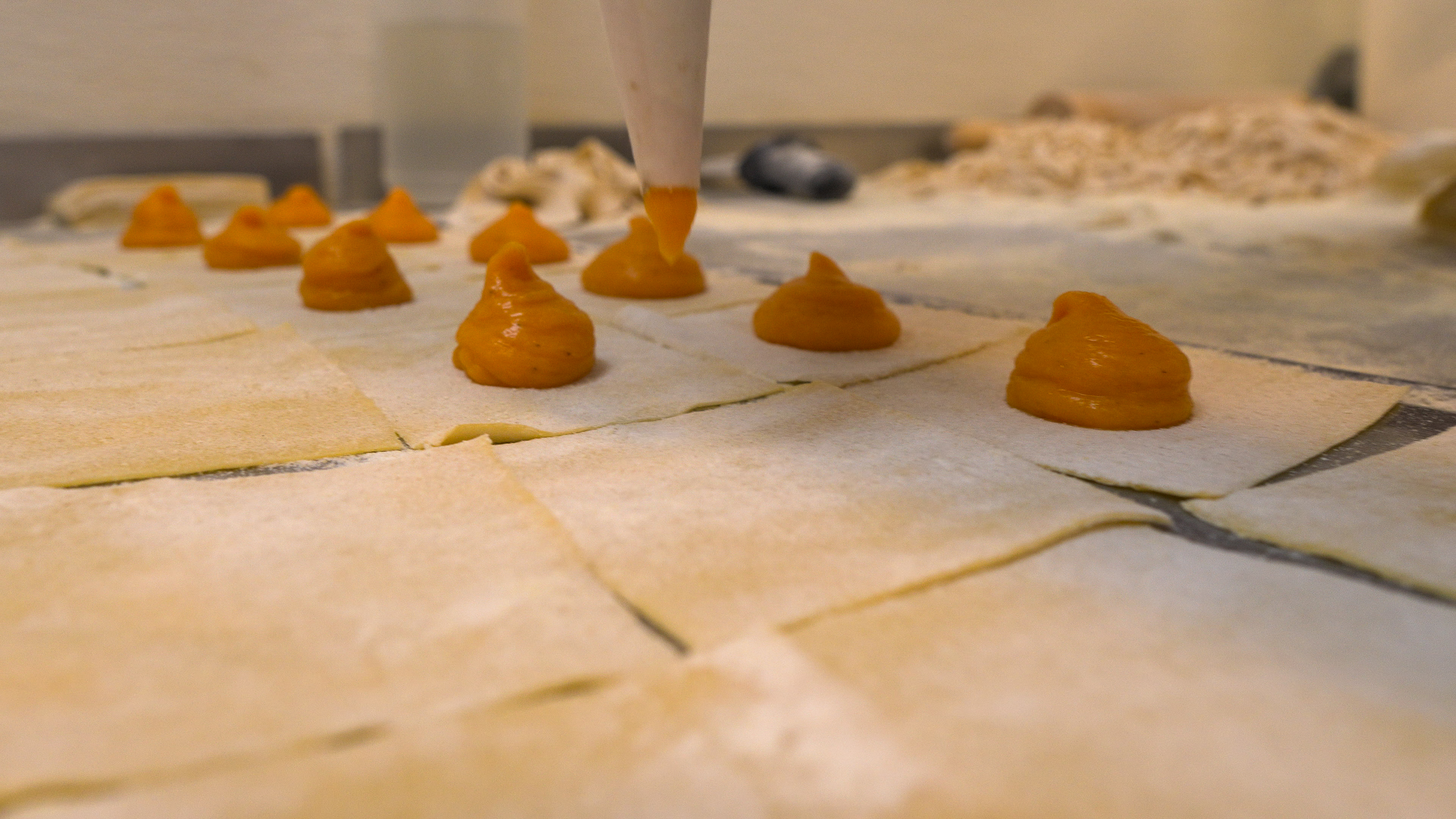 a close up of a cutting board with a cake