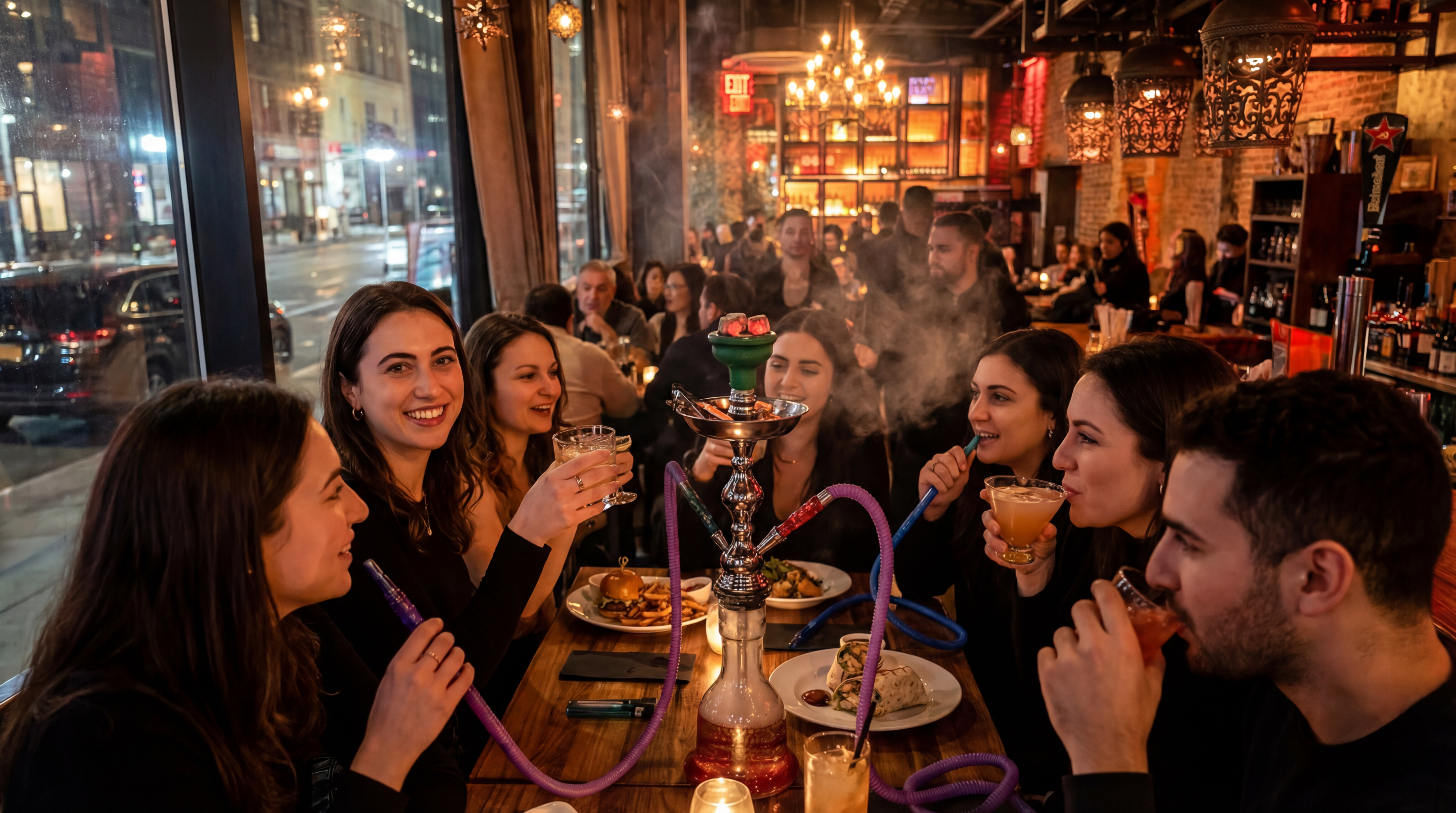 a group of people sitting at a table in a restaurant