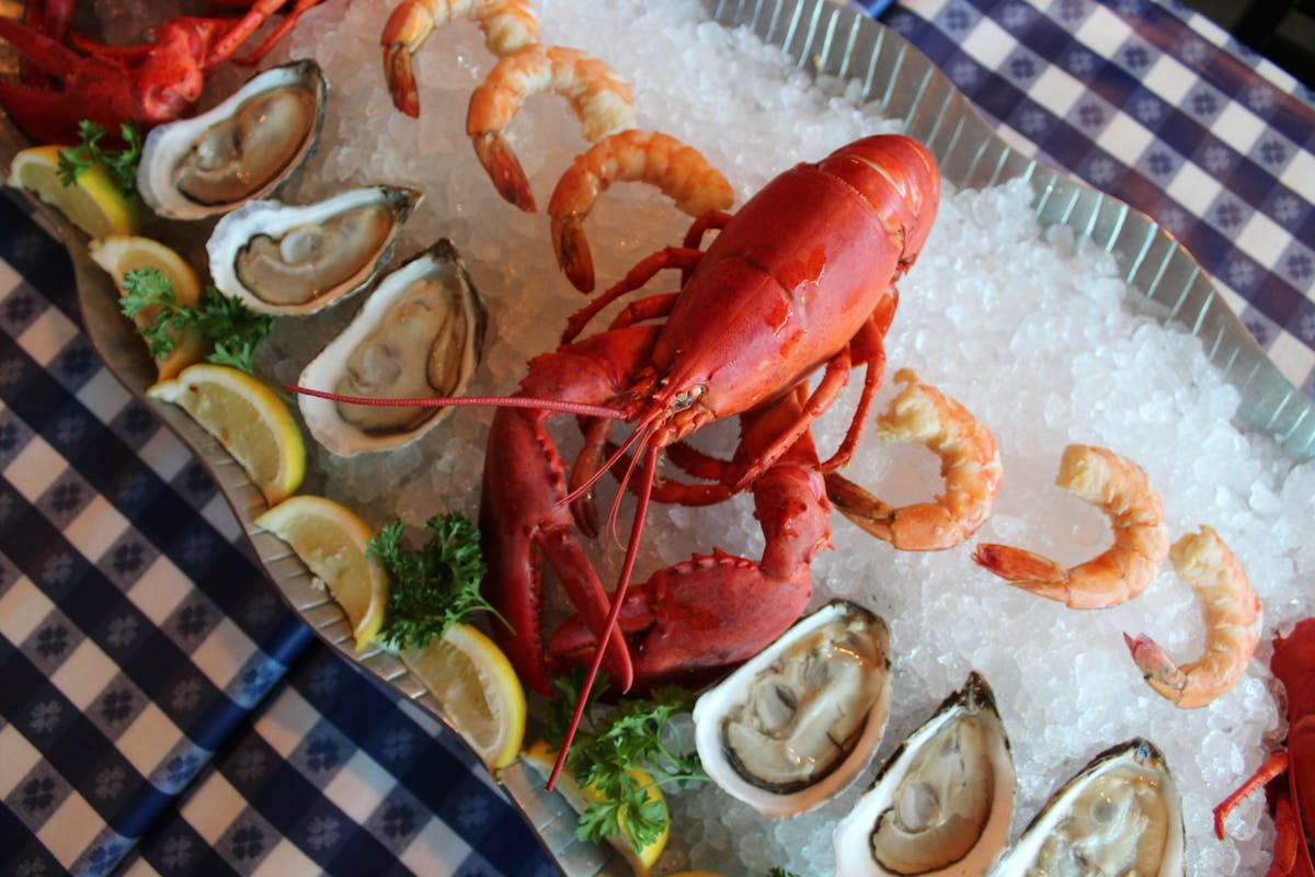 raw oysters, shrimp, and a lobster