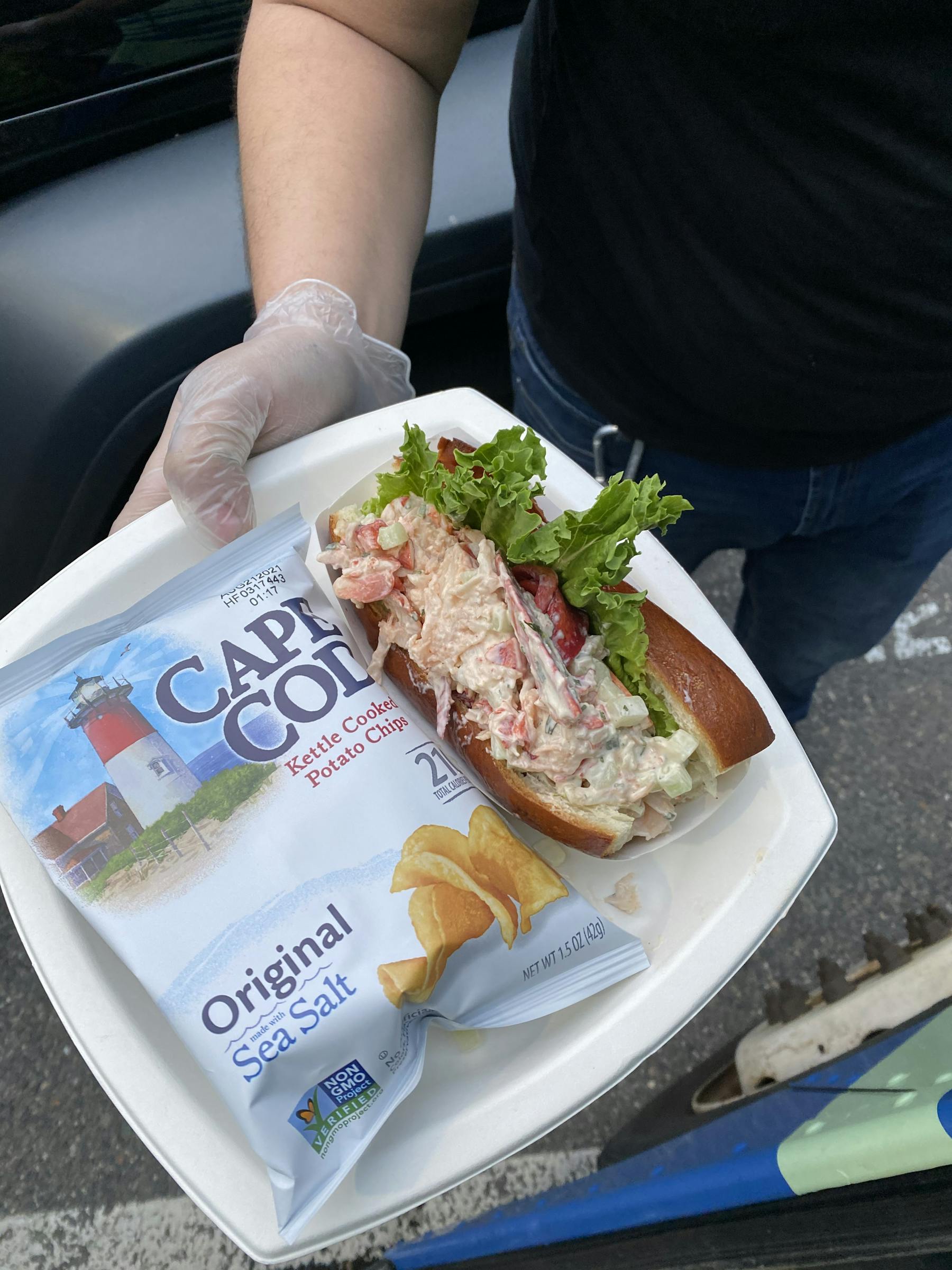 a sandwich sitting on top of a car