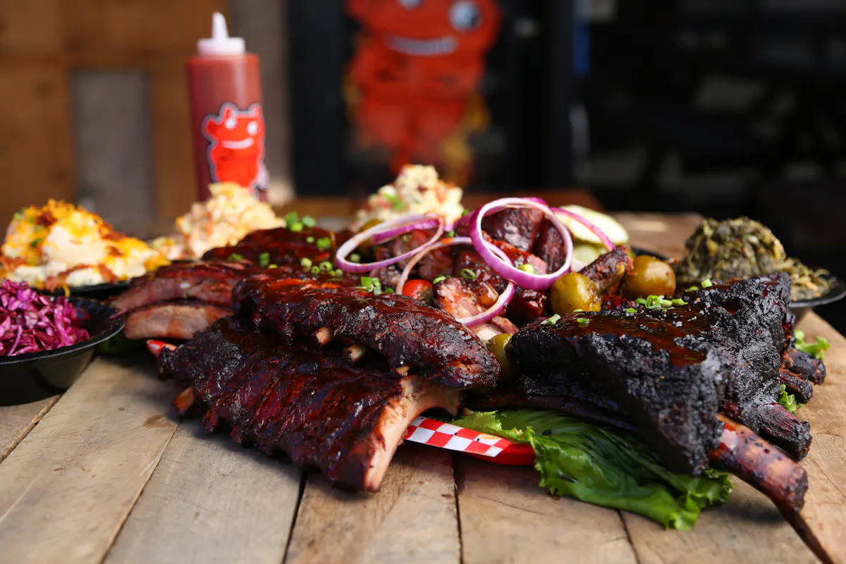 a close up of food on a wooden cutting board