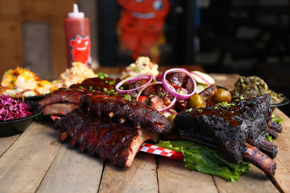 a close up of food on a wooden cutting board