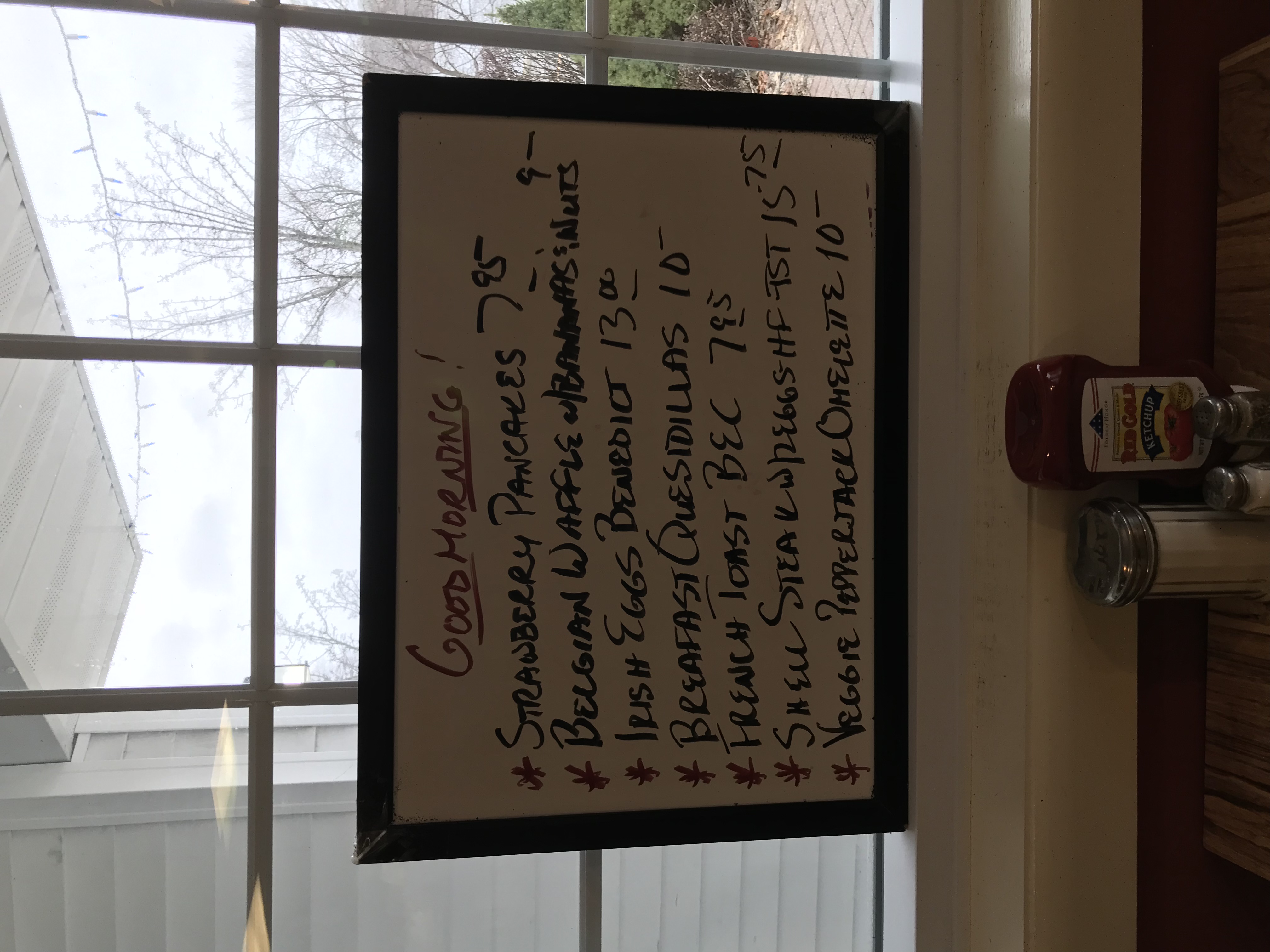 a sign on a window sill