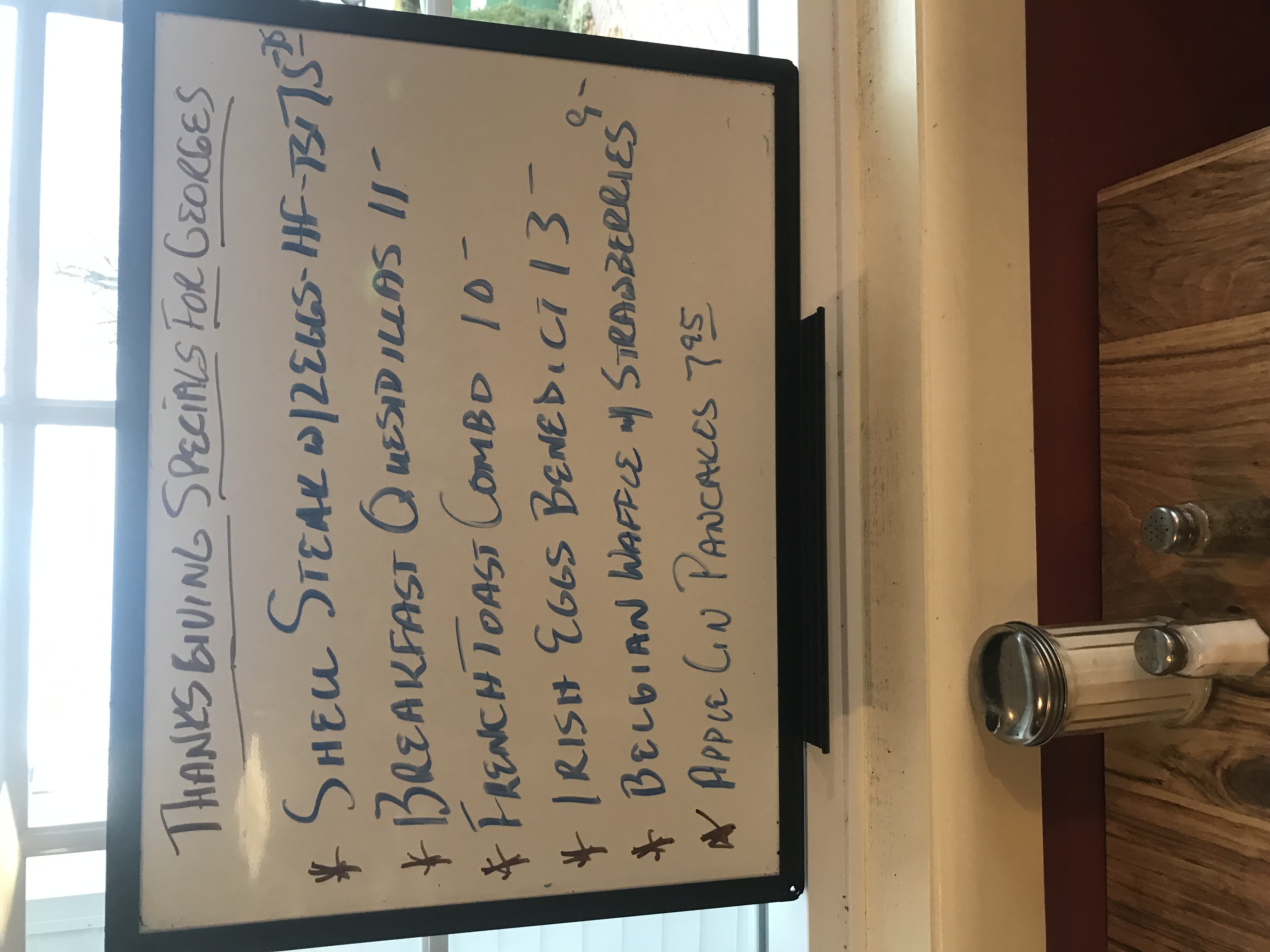 a close up of text on a wooden table