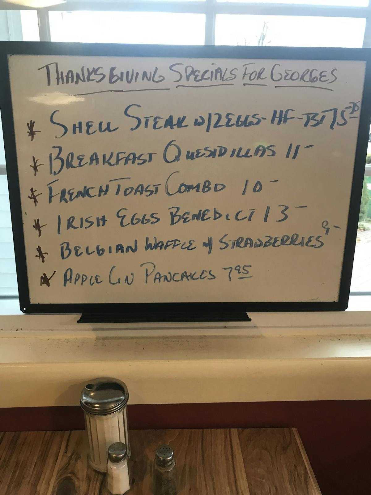 a close up of text on a wooden table