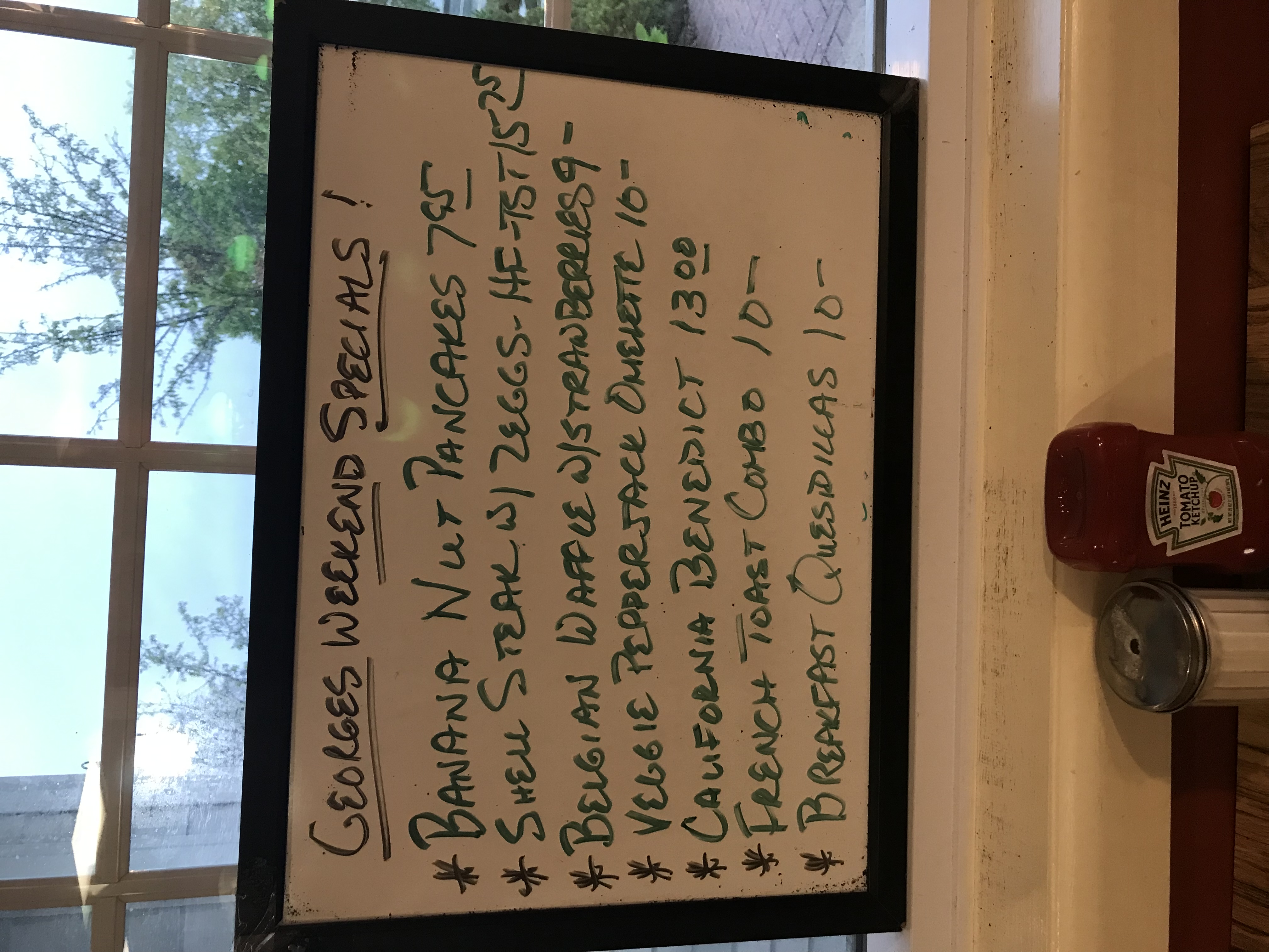 a sign on a window sill