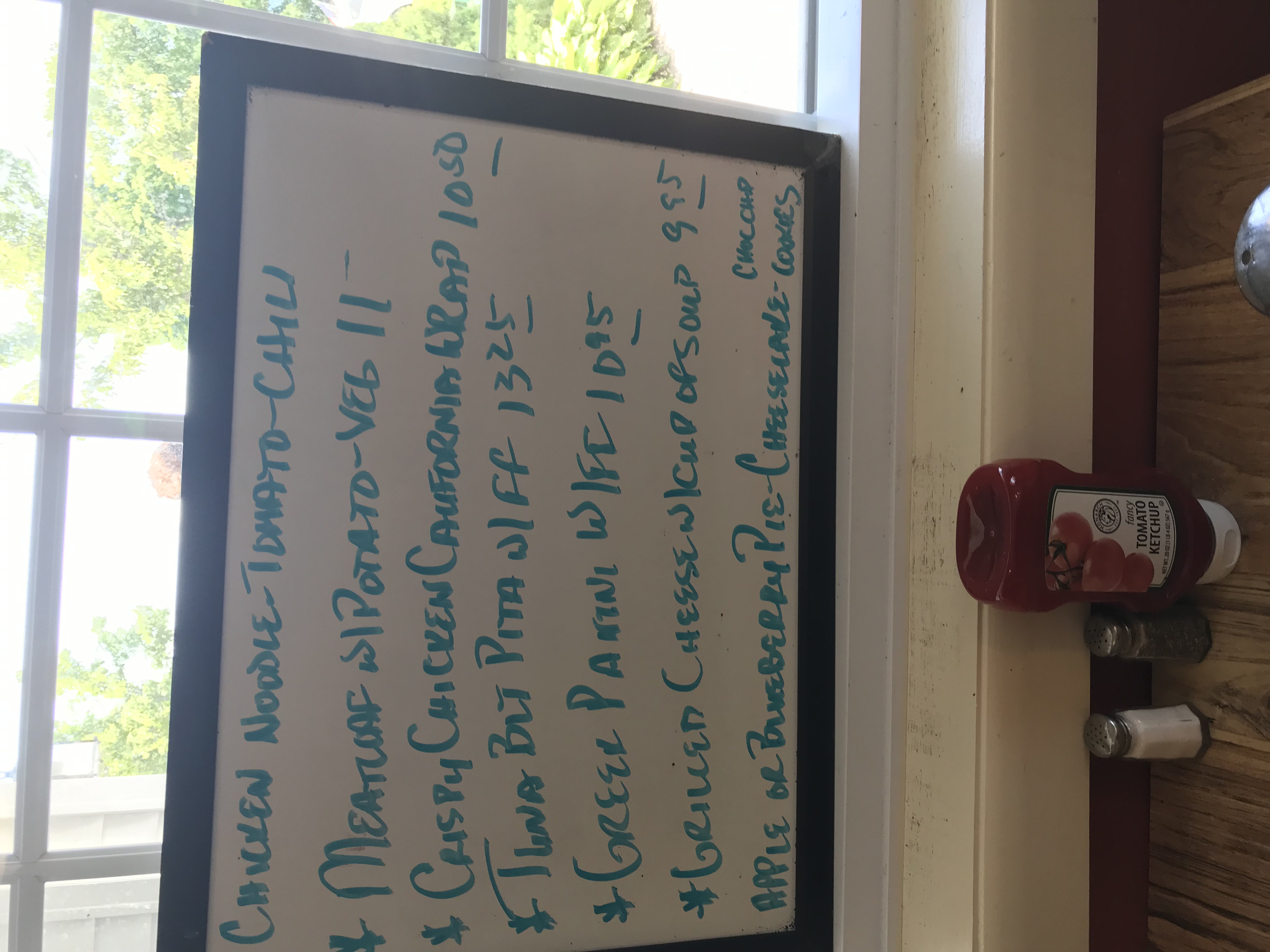 a sign in front of a window