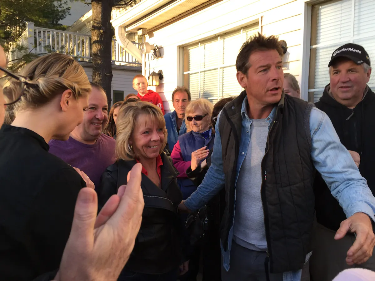 Ty Pennington et al. posing for the camera