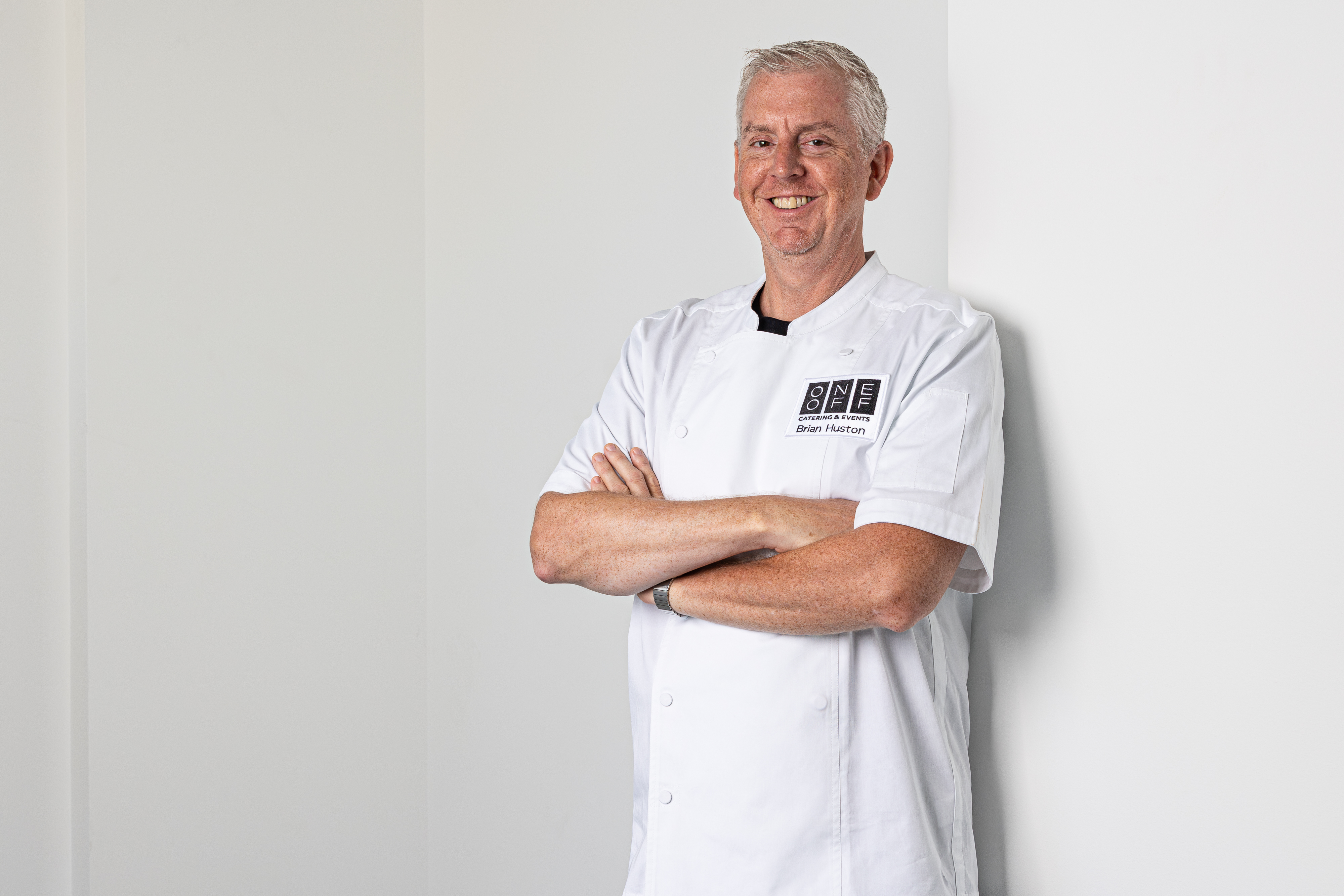 a person standing posing for the camera