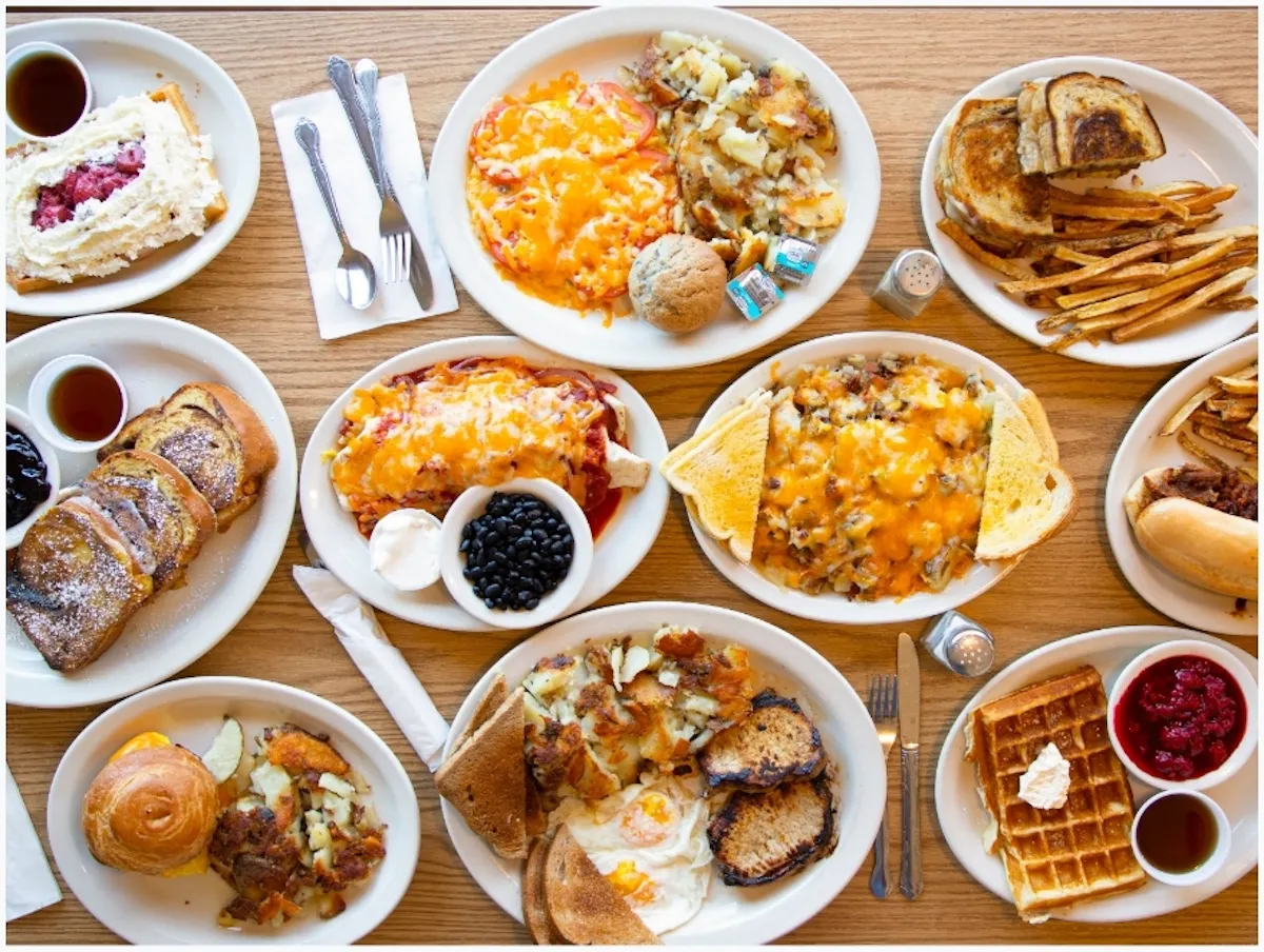a bowl filled with different types of food on a table
