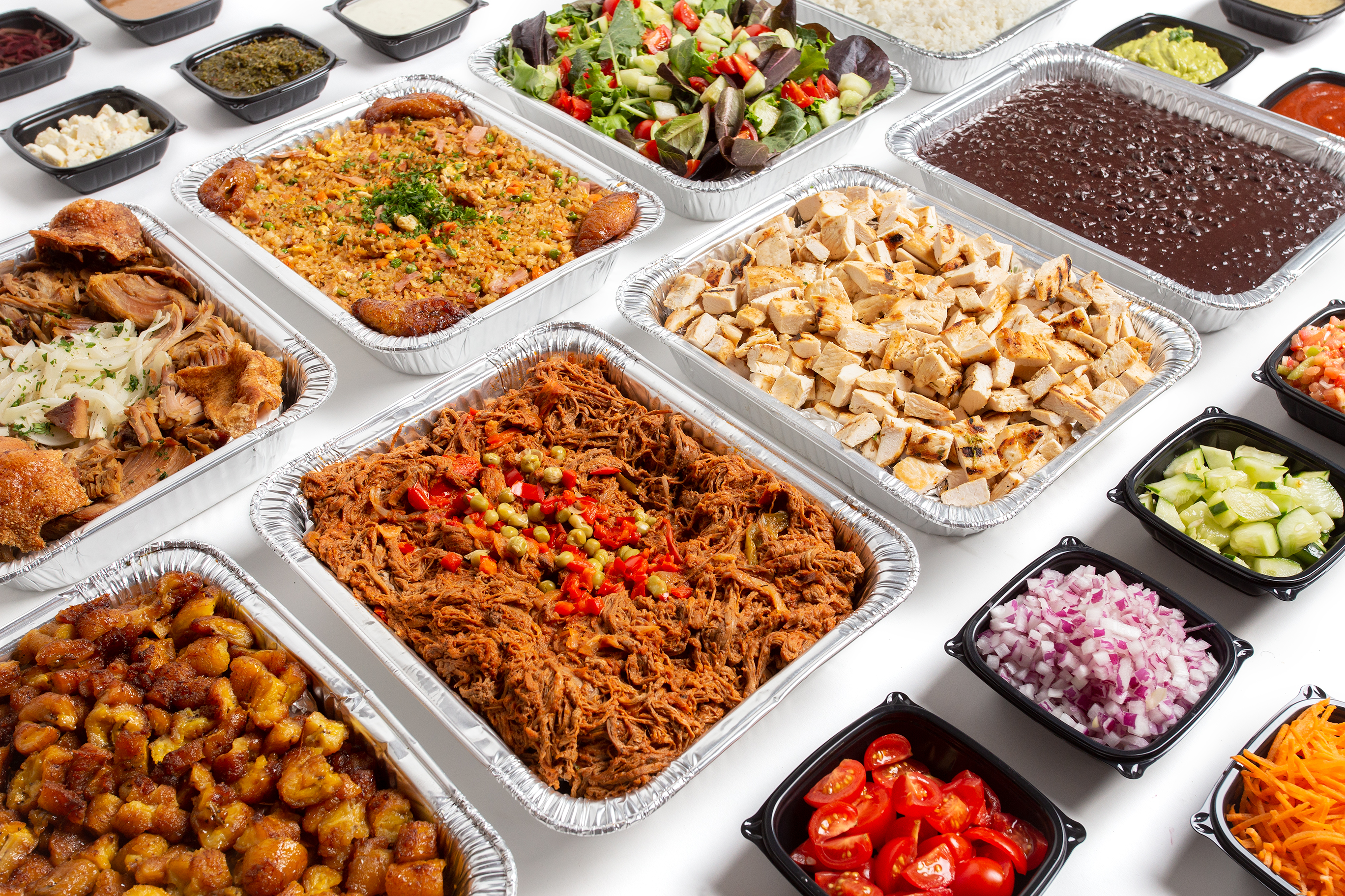 a bunch of different types of food on a table