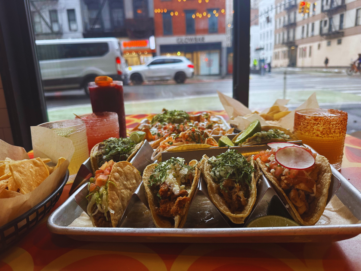 a tray of tacos on a table
