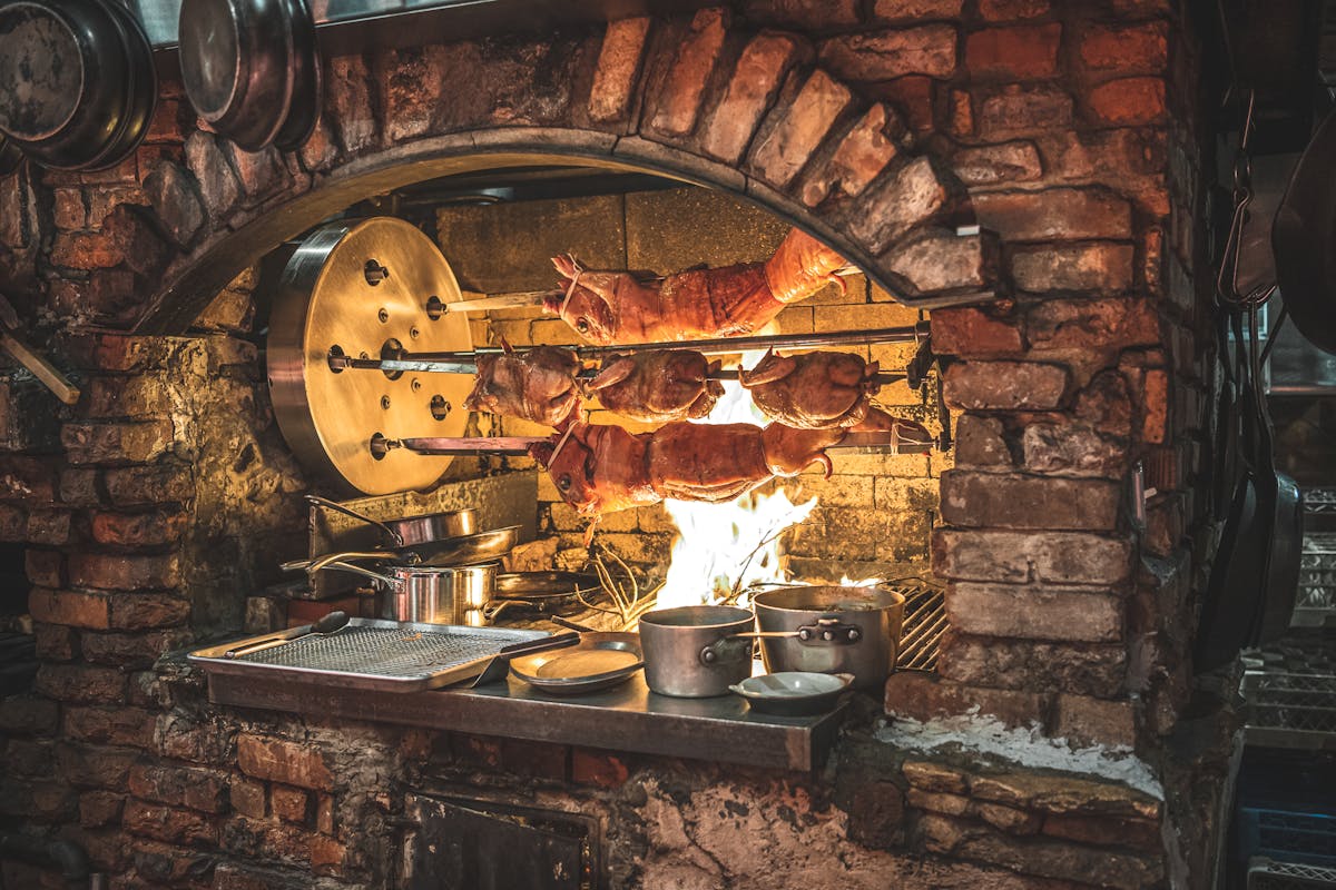 a stove top oven sitting inside of a building