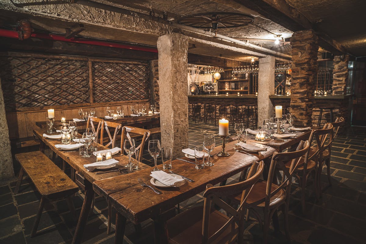 a dining room table in front of a building