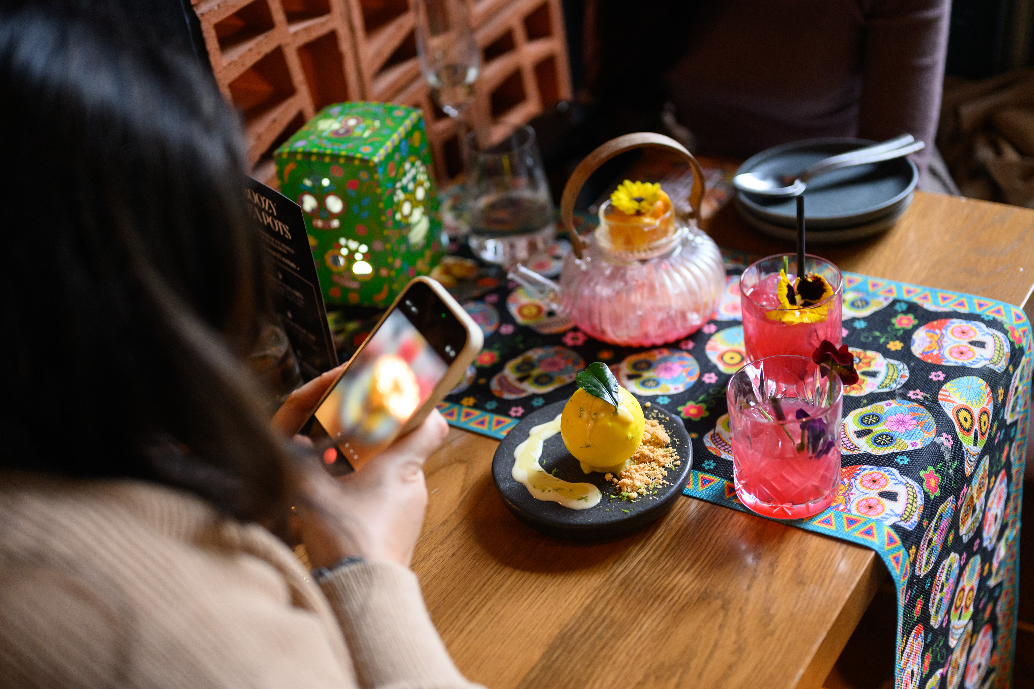 a plate of food sitting on top of a wooden table